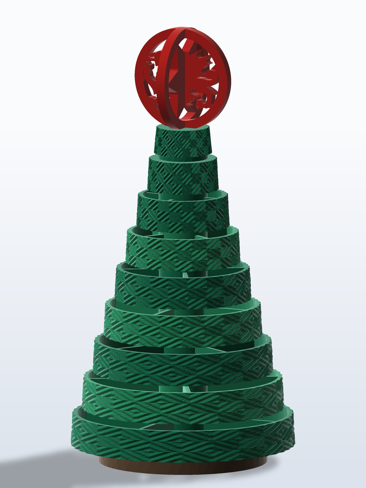 3D printed Christmas tree with the Welsh dragon bauble topper in red